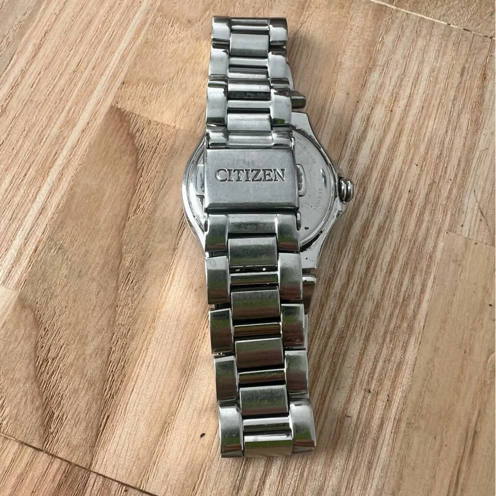 Citizen eco-drive ladies silver tone diamond solar dress watch